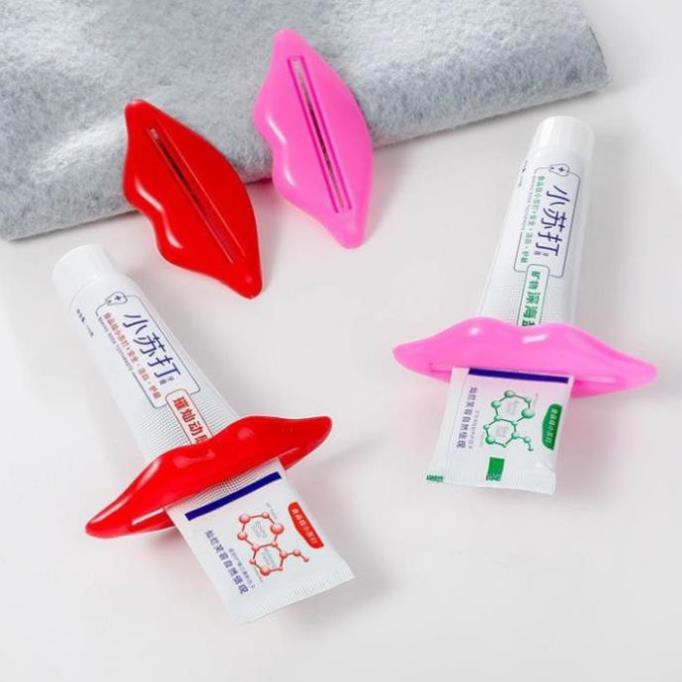 Kẹp nặn tiết kiệm kem đánh răng sữa rửa mặt hình đôi môi