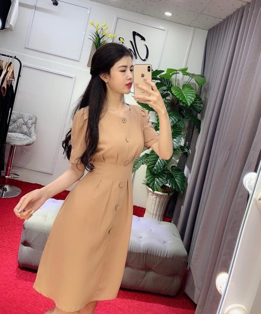 Đầm xoè trích eo nút gỗ