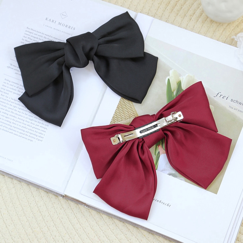 Kẹp tóc màu trơn phối nơ bướm bản to nữ tính hợp thời trang 1