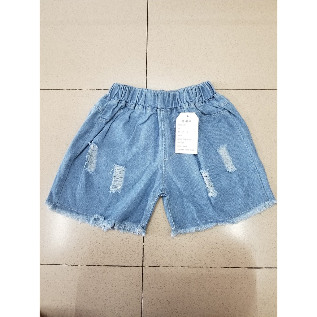 Quần short jean rách tua lai bé gái