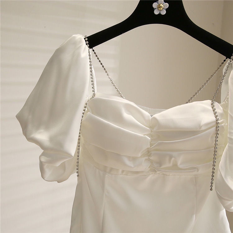 One-word collar chiffon lining careful machine leaking shoulder 100 pleated waist halter halter top 2022 Korean version thin bubble sleeve blouse