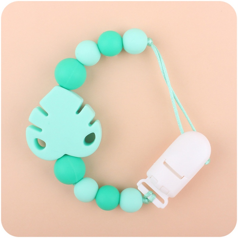 Kẹp Núm Vú Giả Bằng Silicon Hình Chiếc Lá Dễ Thương Cho Bé Sơ Sinh Mọc Răng