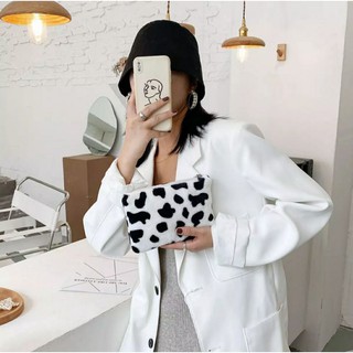 Ví lông bò sữa cầm tay