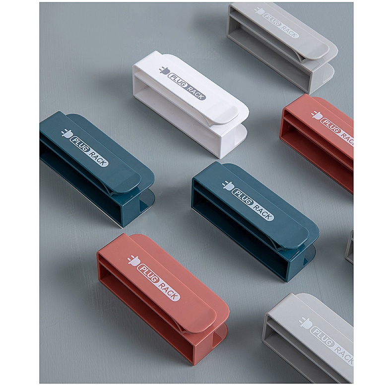 Giá đỡ phích cắm điện dán tường thiết kế tiện dụng