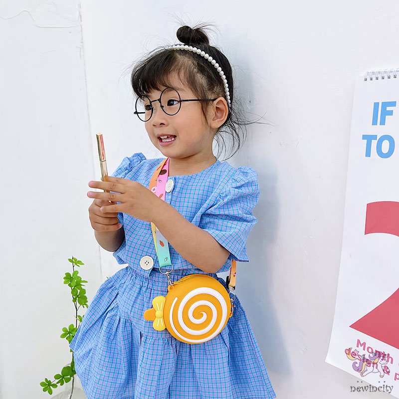 Túi đeo chéo hình kẹo mút đáng yêu dành cho bé gái