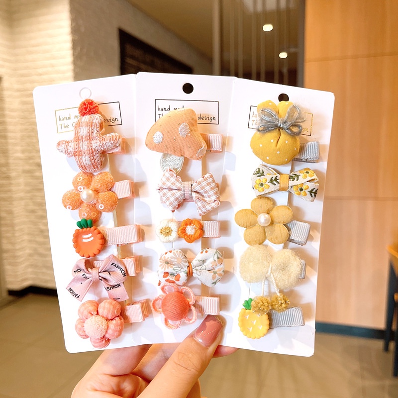 Set 5 Kẹp tóc hình hoa nơ dễ thuơng cho bé gái.