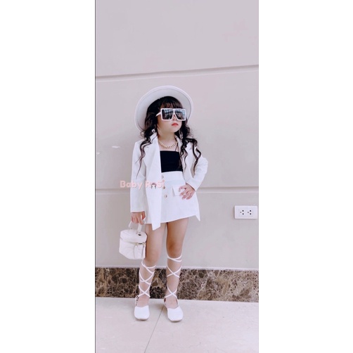 Chân váy chữ A nút vàng cho bé