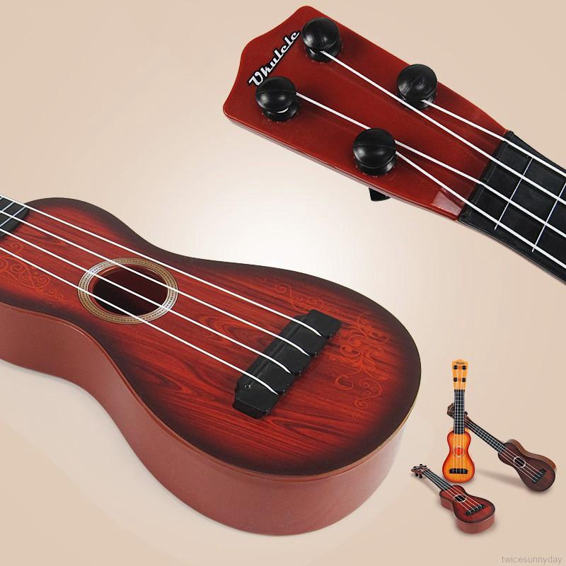 Đàn Ukulele mini bằng nhựa dễ thương dành cho các bé