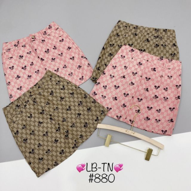 Chân váy ngắn Micky cúc trước bấm | BigBuy360 - bigbuy360.vn