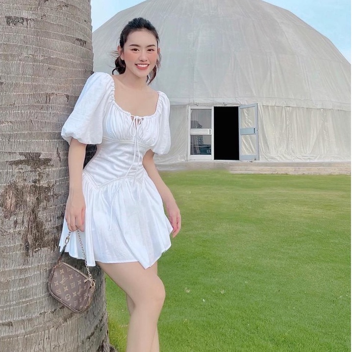 Đầm xòe nhún ngực rút dây đuôi cá tay phồng