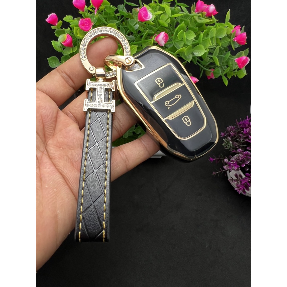 Bọc chìa khóa Peugeot 3008 – 5008 đen vàng sang trọng quý phái.