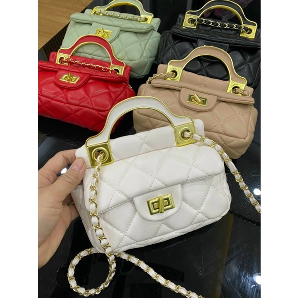 Túi Vân Ô trám khoá xoay có quai cầm chất da mềm zize 15 chuẩn đẹp