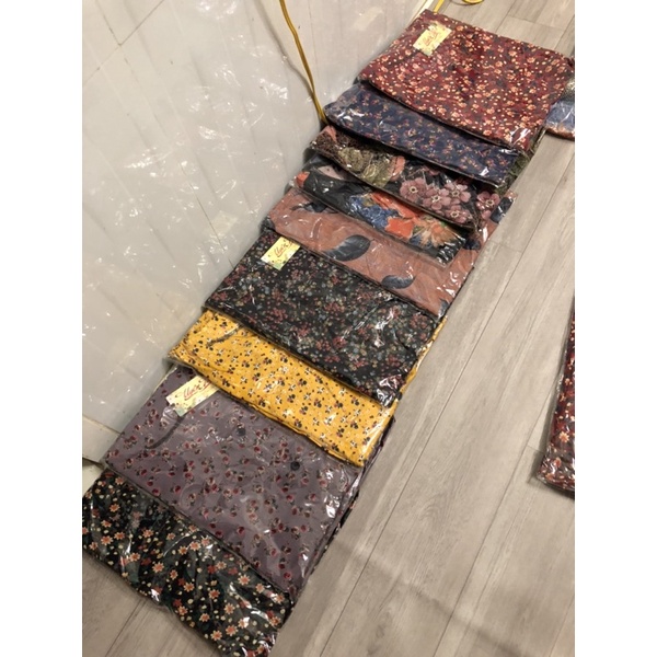Đồ bộ bà ba vải tole lanh gài cúc có túi áo