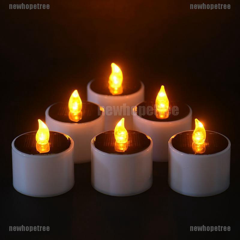 Đèn LED năng lượng mặt trời hình cây nến màu vàng mô phỏng ngọn lửa