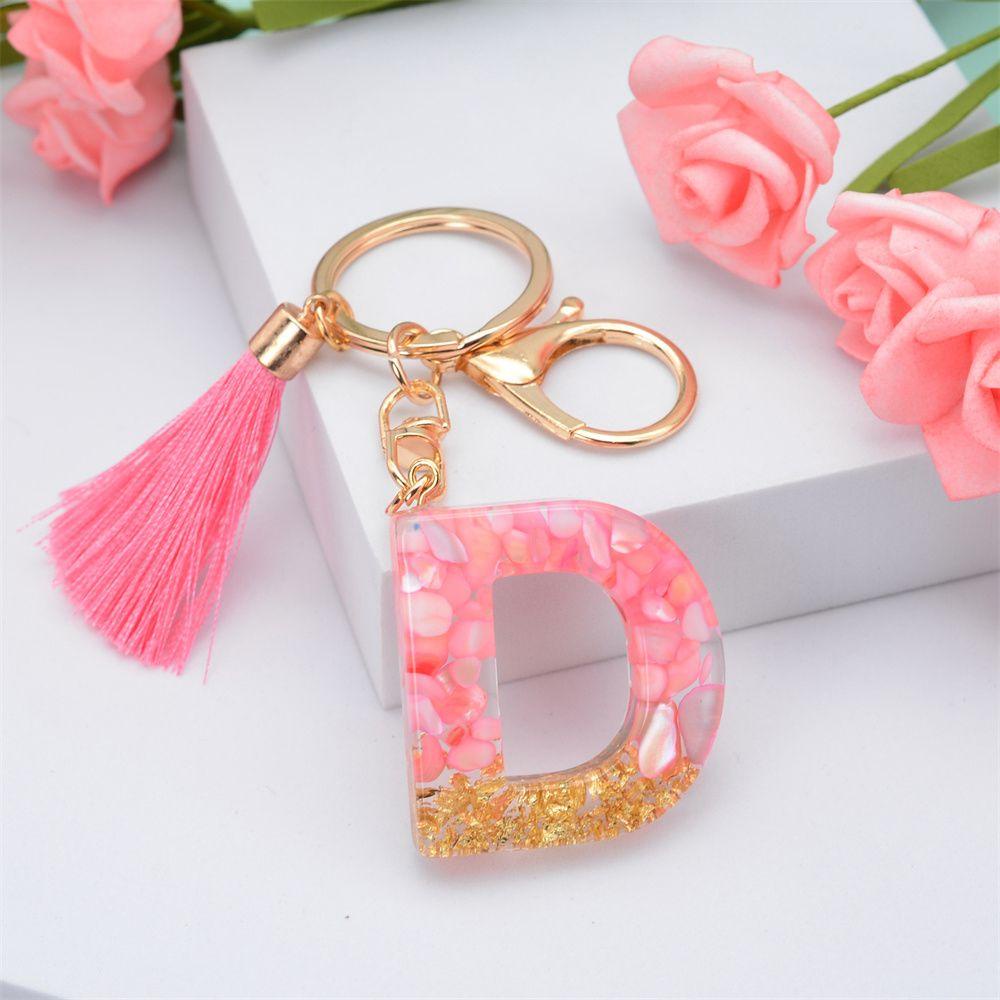 Móc Khóa Hình 26 Chữ Cái Tua Rua Dễ Thương