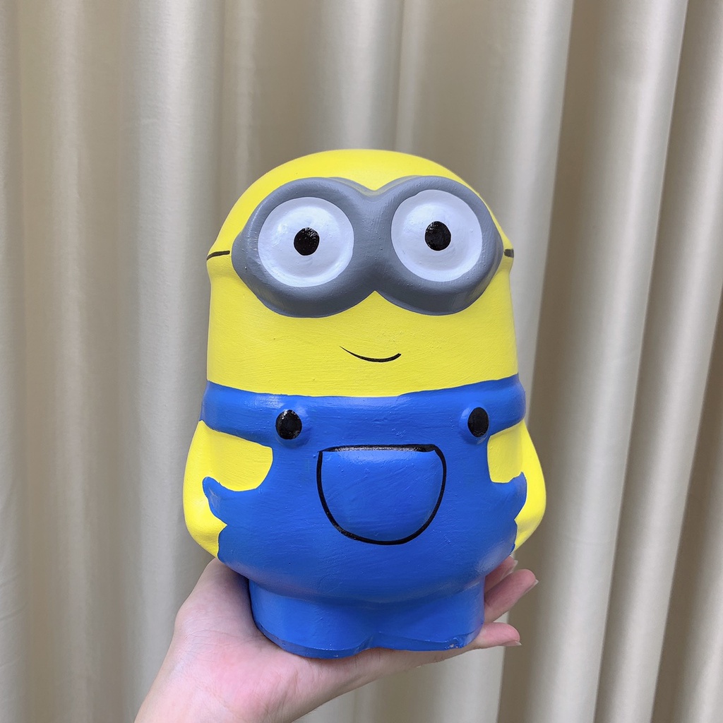 Lợn đất tiết kiệm cute dễ thương hình minion, con ống heo đẹp giá rẻ cao khoảng 20-22cm,_