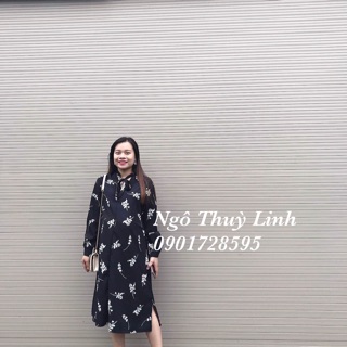 Váy suông màu đen hoa trắng freesize. Váy suông màu đen hoa trắng freesize.