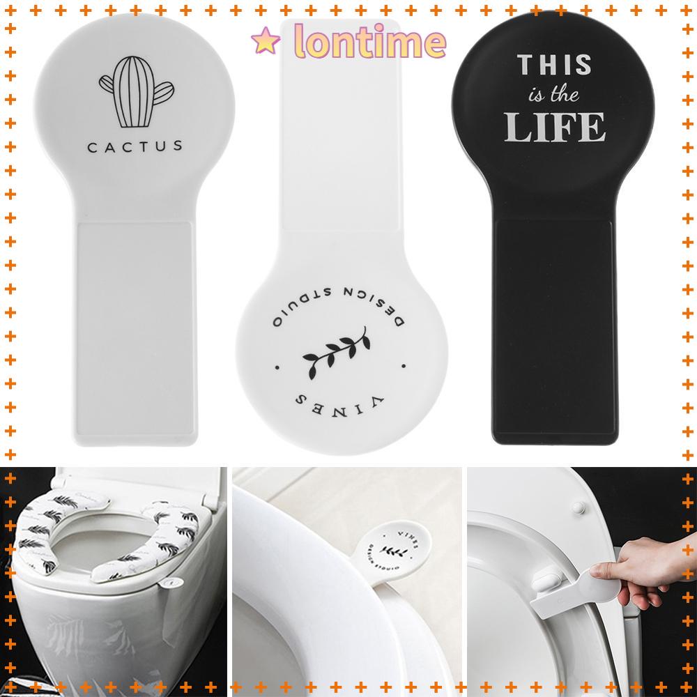 Dụng cụ nâng nắp bồn cầu