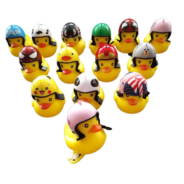 Đồ chơi vịt vàng đội mũ bảo hiểm có còi và đèn Led gắn xe cho bé chơi