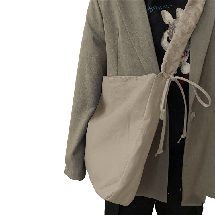 FREESHIP 50K_ Túi vải mềm đeo chéo phong cách Nhật dây rút trơn nhiều màu size 44cm phù hợp đi học, đi chơi, du lịch T34