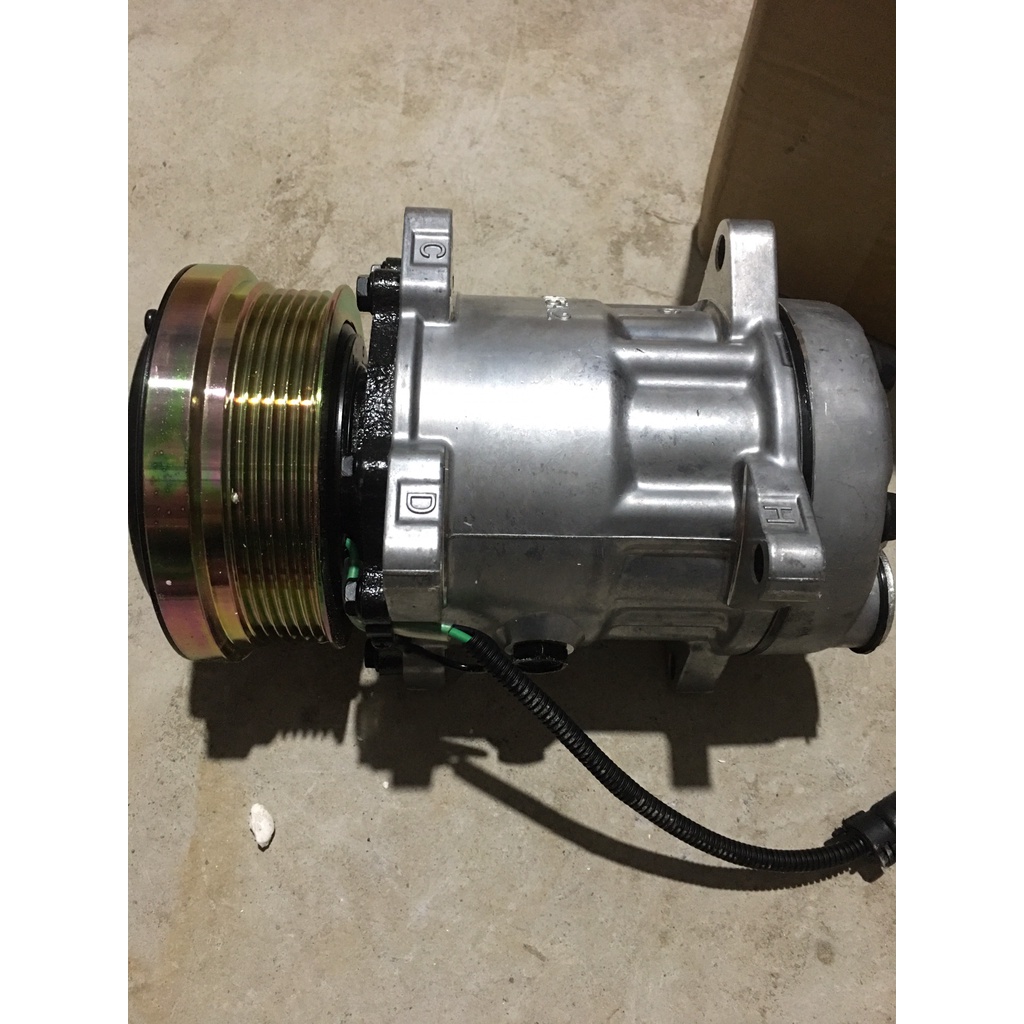 Lốc điều hoà HW101 dùng cho xe Howoo máy điện Buly 110mm/6pk 24V