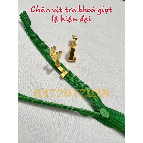 chân vịt tra khoá lệ vàng-phụ liệu may mặc