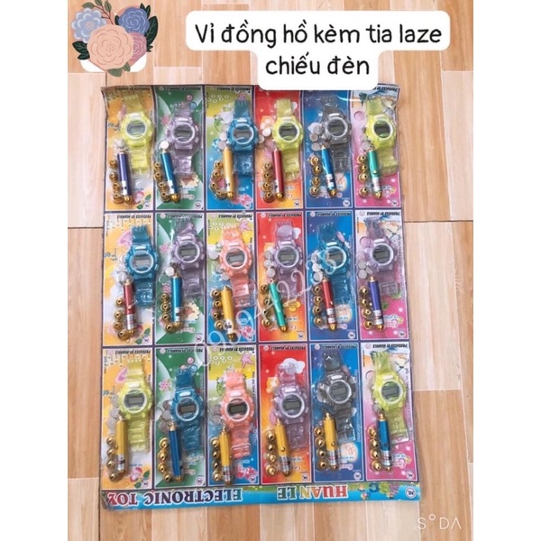 Vỉ 18 bộ đồng hồ kèm đèn chiếu laze(có kèm pin)