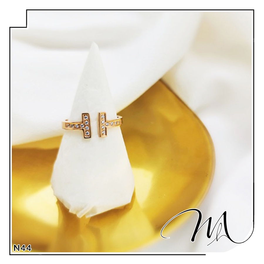 Nhẫn nữ Titan freesize chữ T đính đá phối xà cừ - Măng’s House N44