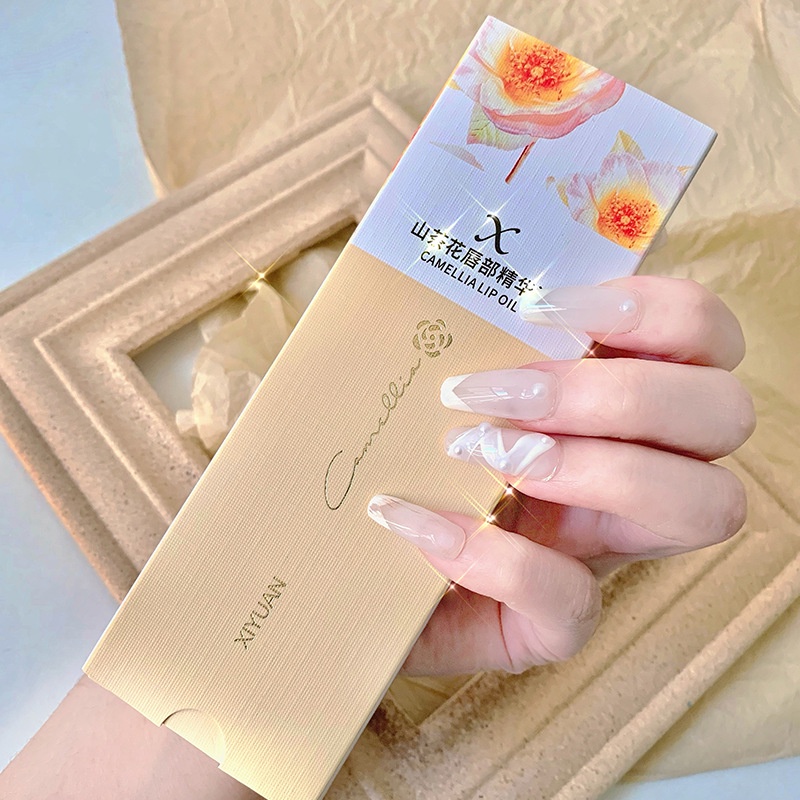 Tinh dầu hoa trà XIYUAN tẩy tế bào chết chống khô môi