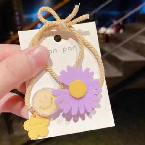 Dây thun buộc tóc đính hoa hướng dương nhỏ cho bé gái