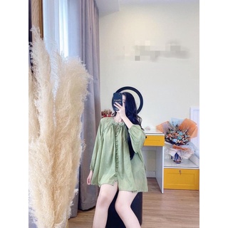 Áo sơ mi xanh cúc bọc