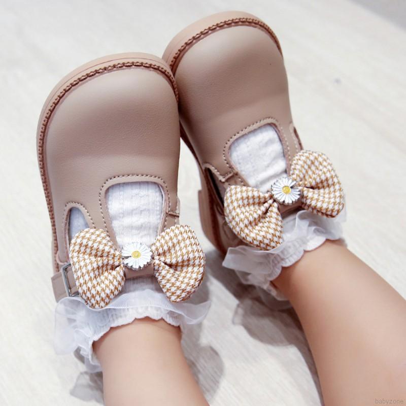 Giày bít mũi phối nơ đế mềm chống trượt thời trang