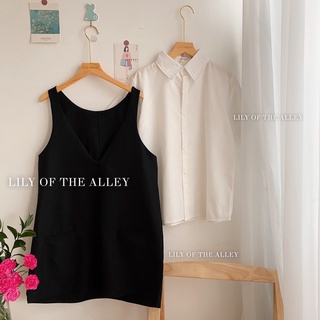 Set sơ mi trắng váy yếm đen