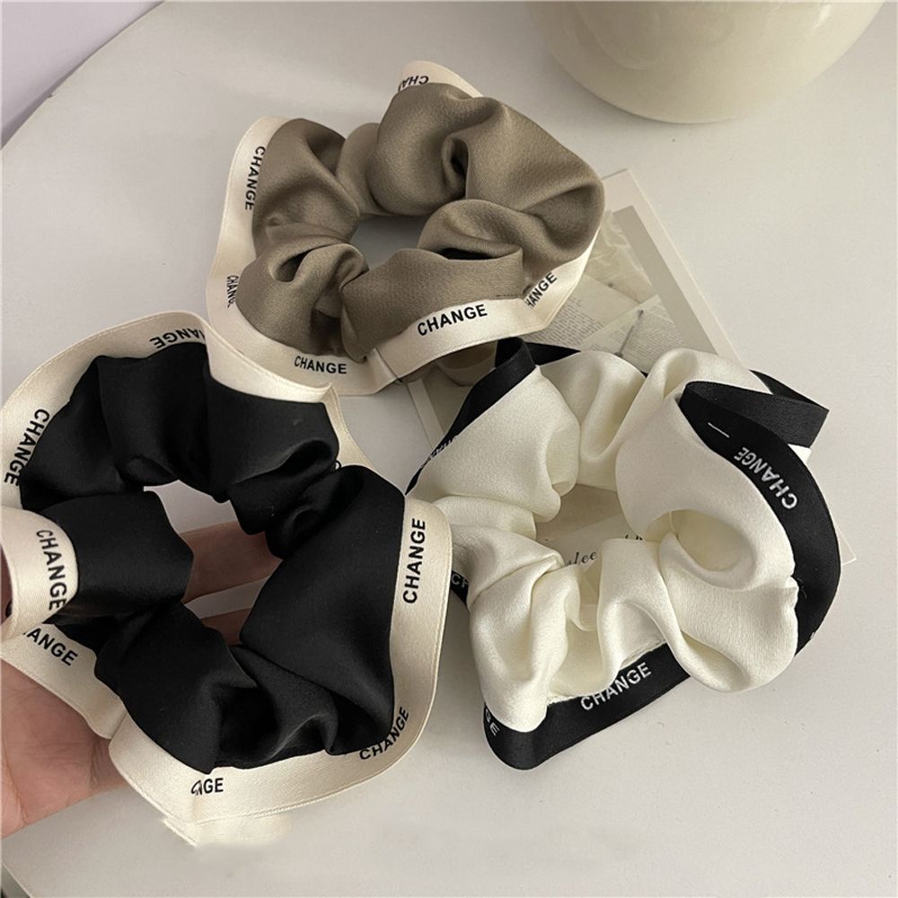 Dây buộc tóc co giãn màu trơn in chữ phong cách Hàn Quốc thanh lịch dễ thương cho nữ