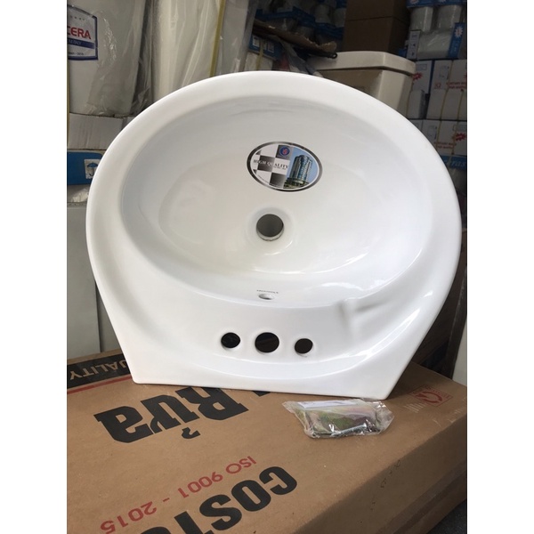 Chậu lavabo 3 lỗ Minh Long  giá rẻ  Kích thước: 50D*43R*17C mm có kèm giá đỡ chậu