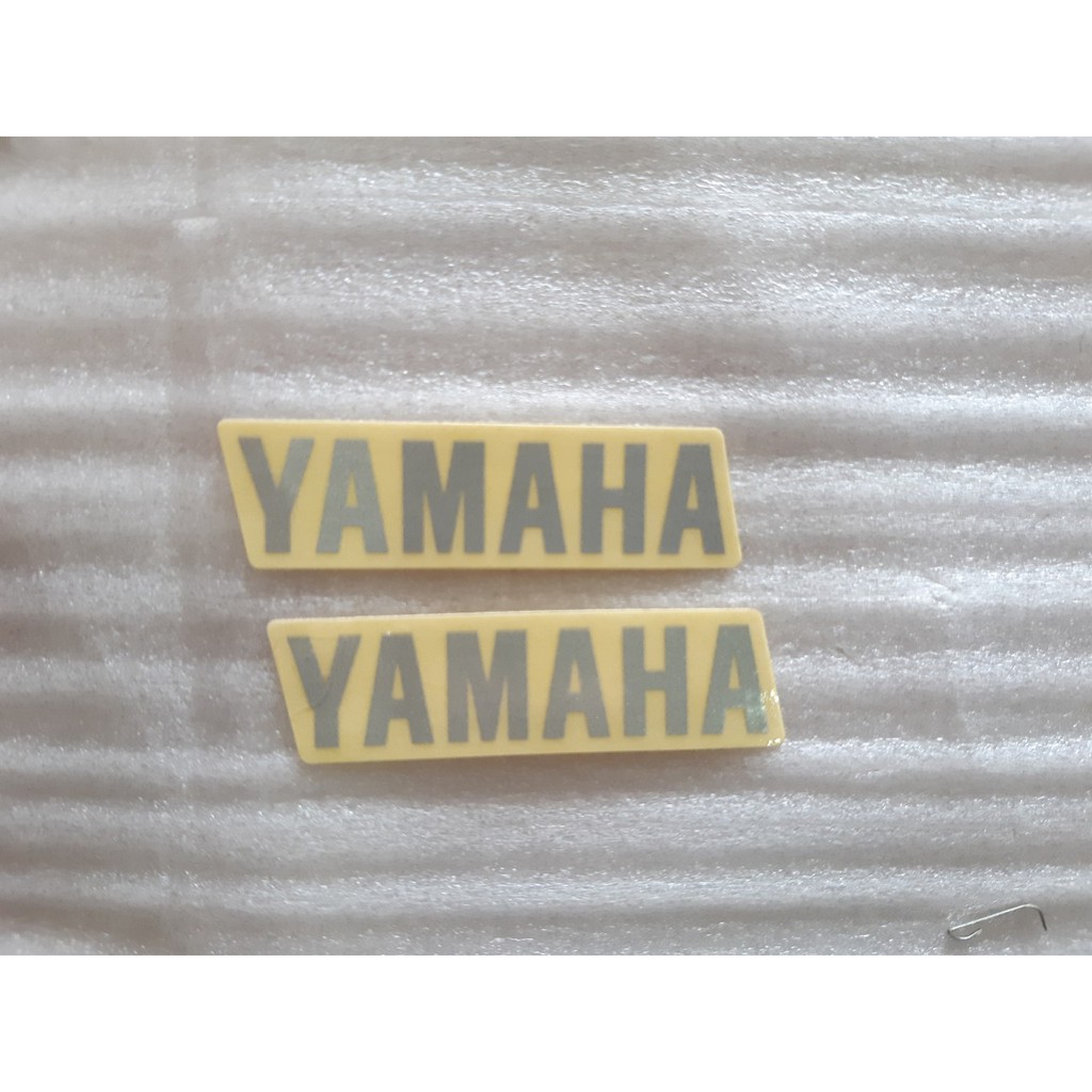 Tem chữ Yamaha nhỏ bạc