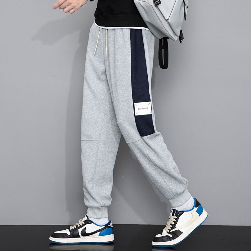 Quần Dài Thể Thao Dáng Rộng Có Túi Sau Lưng Thời Trang Mùa Thu Cho Nam