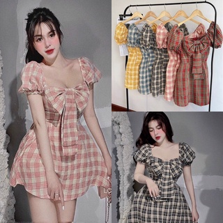 Đầm xoè caro nơ ngực tay phồng