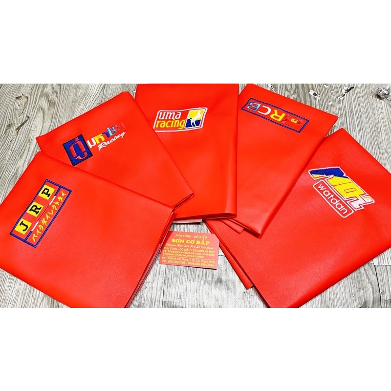 Da yên đỏ trơn thêu họa tiết gia công tại xưởng giá sỉ bọc tất cả các yên xe kích cỡ lớn