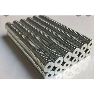 set ( 1-5 viên )nam châm . tròn có lỗ bằng và lỗ col