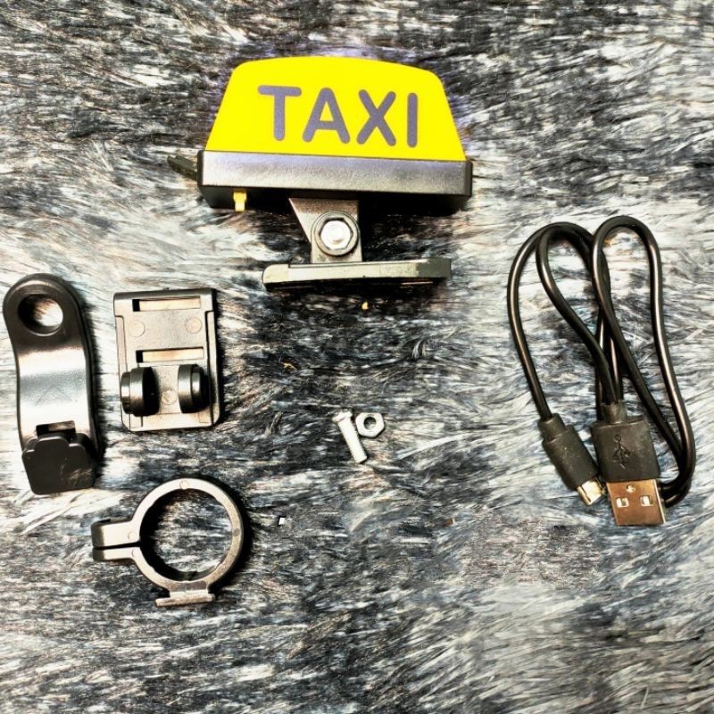 Led Taxi gắn chân kiếng