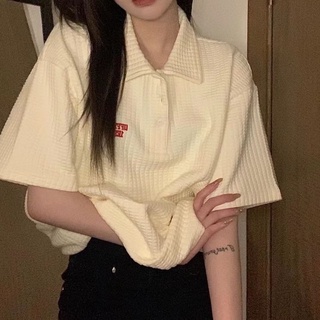 Áo polo dập nổi