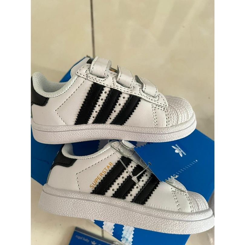 Giày das xuất dư 3 sọc cho bé