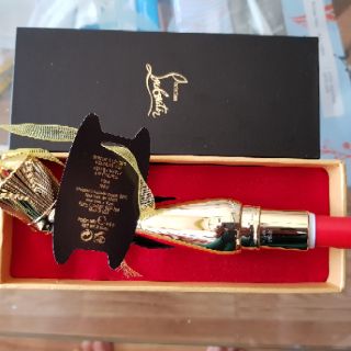 SON CHRISTIAN LOUBOUTIN
