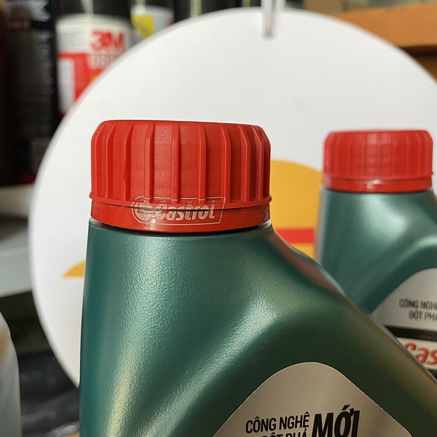 Dầu nhớt ô tô 5W30 Castrol Magnatec chai 1l: nhớt ô tô Castrol tổng hợp toàn phần cho máy xăng, dầu diesel và xe hybrid