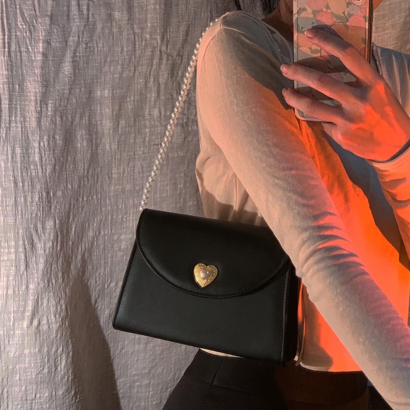 Quai chuỗi hạt thay thế cho túi xách