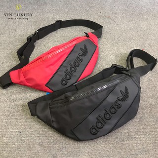 [BH 12Tháng]Túi Đeo Chéo Nam/Nữ Logo Thêu Nổi l Túi Bao Tử Thời Trang - VT2010