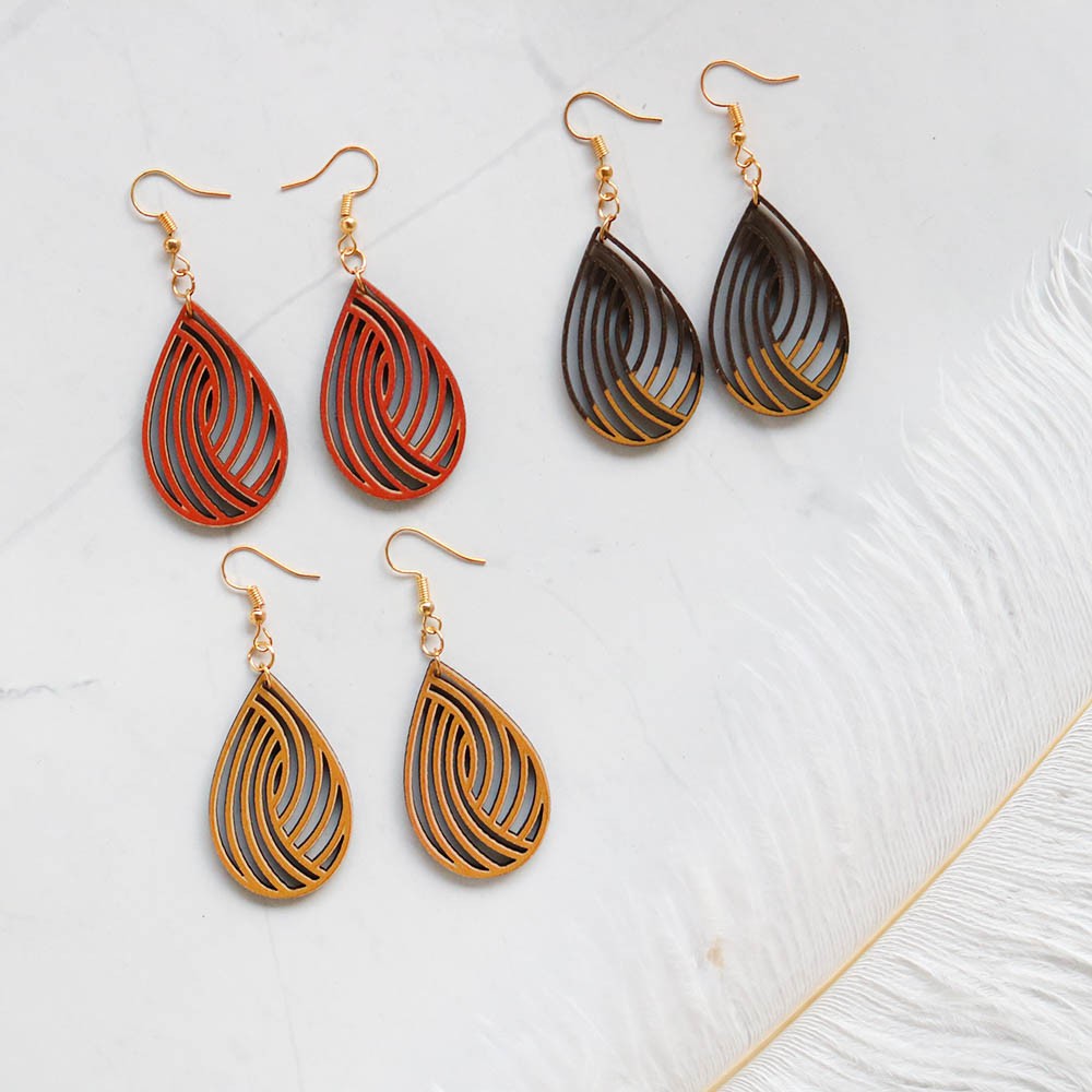 Sỉ 100 đôi khuyên tai gỗ họa tiết