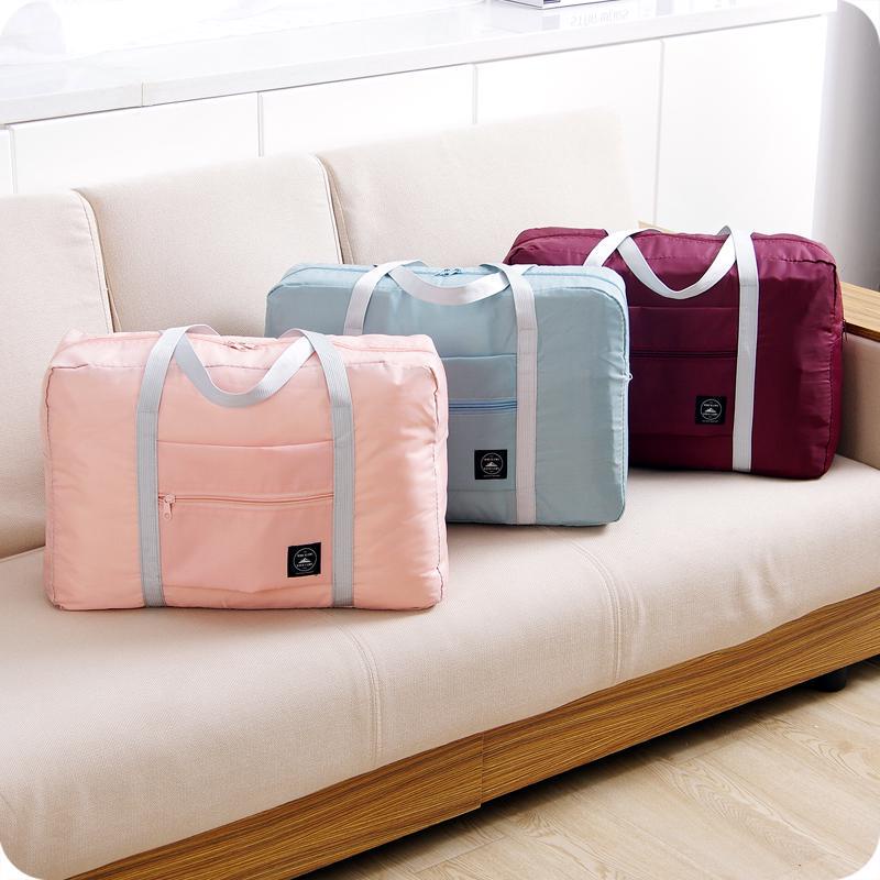Túi Du Lịch Cỡ Lớn Có Bánh Xe Kéo Chất Liệu Nylon Chống Thấm Nước Có Thể Gấp Gọn Tiện Dụng Cho Nữ