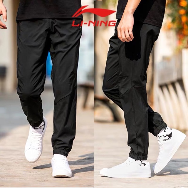 Quần gió lining nam AYKP297
